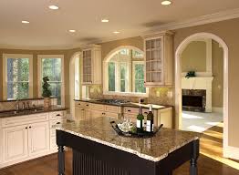 The walls are painted in a color similar to marsala, with plain white ceilings, and the countertop is of a gorgeous slab of giallo st. Santa Cecilia Granite Countertops Cost Reviews