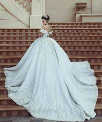 Fit and flare silhouette fully covered with soft and drapeable lace which has rose flower ornaments! Pin By Hind Salim On Wedding Dresses Wedding Dresses Bridal Dresses Dream Wedding Dresses