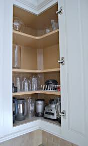 Tips For Designing An Organized Kitchen Upper Kitchen Cabinets Kitchen Corner Cupboard Corner Kitchen Cabinet