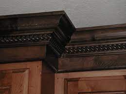 I have also seen people choose to stain crown molding the same color as their other stained trim. Maple Stained Cabinets With A Darker Crown Molding Traditional Kitchen Other By Grandview Custom Woods Houzz