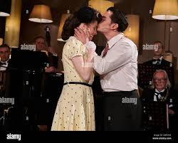 Berlin, Germany. 11th Dec, 2019. The actors Hannah Redlich and Janko  Danailow kiss during the photo rehearsal at the Ritz Carlton Berlin.  Danailow plays the younger Frank Sinatra in "That's Life -