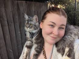 Thought I'd share picture of my Maine Coon Garfield, he is just turning  five months and weighs 5 kg is for a normal and good weight for him ￼￼