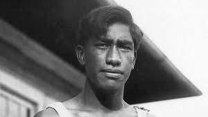 Duke Kahanamoku rides Corona Del Mar, Orange County Register, 1914