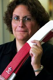 Human rights director's efforts win her a new belt