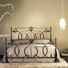 It's made of wrought iron with a worn greyish finish. Wrought Iron Bed Buying Guide Offer Great Buy Get