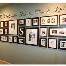 25 Photo Wall Creations That Will Make Your House A Hit Display Family Photos Wall Gallery Picture Hanging