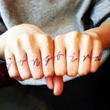 Songbird Tattoo Knuckles Tattoo Songbird Feminine Script Propheticsinger Singyoursong Yolo Knuckle Tattoos Tattoos Knuckle Tattoo