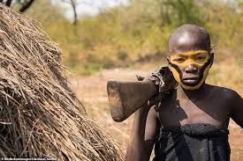 Stunning photos reveal the unique beauty of Ethiopia's much-feared Mursi  tribe | Daily Mail Online