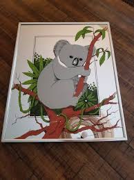 Woman reunited with brave koala she rescued from fire | nine news australia. Vintage Painted Mirror 1970 S Turner Wall Art Koala Bear Jungalow Boho Wall Hanging Bamboo Plants Retro Home Decor Plant Room Kitschy Mirror Vintage Painting Mirror Painting Boho Wall