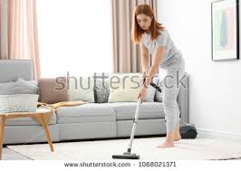 Housewife Hoovering Carpet At Home Shutterstock Premier Hoovering Carpet Home
