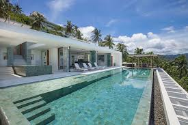 Download Modern Tropical Villa With An Enormous Sparkling Pool Storiestrending Com