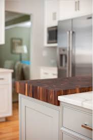 Modern farmhouse kitchens are all about entertaining and hosting gatherings, so it's no wonder or, if you have the budget for new cabinets, forgo a section of closed lower cabinets with a bookcase or cubby to display chic pots and pans and dishware, like this sophisticated design by devol kitchens. Modern Farmhouse Kitchen Design Home Bunch Interior Design Ideas