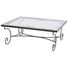 We personally fall hard for waterfall tables. Spanish Style Wrought Iron And Glass Coffee Table For Sale At 1stdibs