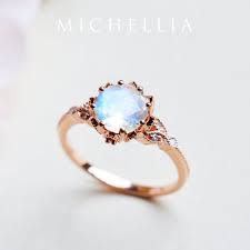 Well you're in luck, because here they come. Evanthe Moonstone Engagement Ring Vintage Floral Moonstone Etsy