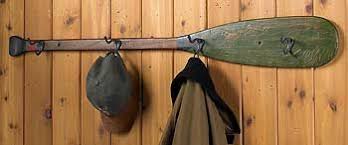I Have An Old Paddle Put Hooks In It And Hang Photos From It Instead Of Hats And Coats Paddle Decor Cabin Decor Oar Decor