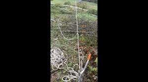 I tie off to another tree. Felling A Tall Tree Leaning The Wrong Way Using A Maasdam Rope Puller Rope Come Along Youtube