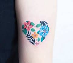 The flower heart tattoos can be different, but all of them are tender and good looking. Flowers Heart Tattoo By Zihee Tattoo Post 26184