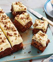 Carrot And Sultana Cake With Creamy Orange Frosting Recipe Recipe Tray Bake Recipes Carrot Cake Traybake Tray Bakes