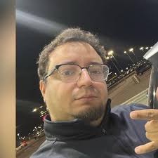 She's holding a wine glass. Case closed