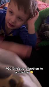 Protective Brothers: The Bond with Their Little Sister