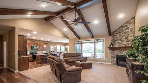 Great Room Of Allison Model Features Cathedral Ceilings With Wood Beams And Cathedral Ceiling Living Room Ceiling Lights Living Room Cathedral Ceiling Bedroom