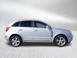 Image result for Silver Topaz 2013 Captiva