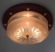 Mini pendants and flush mount lights in various finishes. 1940s Flush Mount Nautical Theme Ceiling Lamp By Lightoier At 1stdibs
