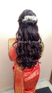 Great look for a boho or rustic wedding. Pretty Cascading Curls Bridal Reception Hairstyle By Swank Curls With Fresh Flowers Bridal Silk Bridal Hairdo Indian Bridal Hairstyles Reception Hairstyles