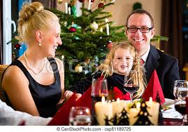 German dishes shine when served with their traditional sides. Family Celebrating Christmas Dinner German Parents And Children Toasting With Wine And Water At Christmas Eve Dinner Canstock