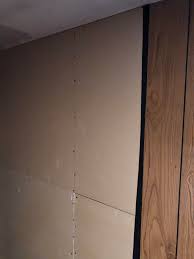 Two main reasons for that are fire rating and ability to. Wood Paneling Removes And This Is The Drywall Behind It How Hard Is It To Find Someone To Tape And Mud This To Finish It In Order To Make It Look Like