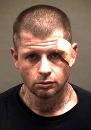 Man facing murder charge pleads in heroin case