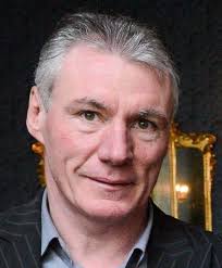 Frank Stapleton now aged 68. Played for Manchester United, Arsenal, Derby  ,Blackburn, and Bradford to name a few. Has won the Fa Cup with Arsenal and  Man utd,and also earned 71 caps