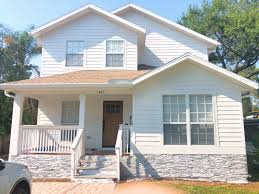 Black roof, white trim, white shutters, royal ironstone dark grey siding and shakes in morton il. Help Need Some Design Opinions We Planned On Going With White Paint Gray Stone Foundation Door As Pictured And A Black Metal Roof Eventually Something Seems Off Though Not Sure If It S