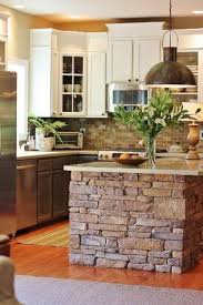 A contrasting kitchen island allows you to introduce new color and texture to the room in an the table's timeworn finish adds a sense of age to this modern kitchen, and its turned furniture legs here, the white island offers a clean and subtle departure from wood cabinets and paneled walls. 40 Rustic Home Decor Ideas You Can Build Yourself Stone Kitchen Island Homemade Kitchen Island Stone Kitchen
