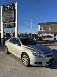 Image result for Silver Topaz 2013 Malibu