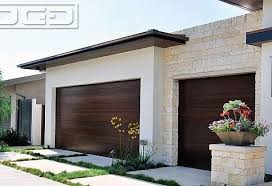 Modern Garage Doors In A Simple Minimalist Design For Oc Luxury Homes Garage Door Design Garage Doors Modern Garage