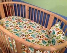 Our selection of cradle and bassinet sheets and bedding makes it easy for you to rock your little one to sleep. 13 Oval Cribs Stokke Or Leander Bedding Ideas Oval Crib Cribs Stokke