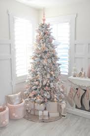 Gold is a popular christmas decoration color. Frosted Christmas Tree With Rose Gold Decorations Novocom Top