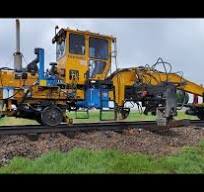 BNSF Tie Replacement Gang in the Rain