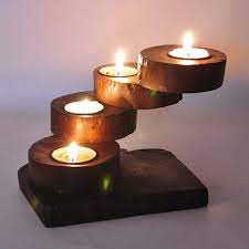 The end product is a naturally beautiful piece of handmade work… simple yet charming! Creative Personality Handmade Wooden Candlesticks Southeast Asia Wood Long Table Candlestick Multilay Wooden Candle Sticks Candle Holders Wood Candle Holders