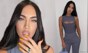 Megan Fox smolders in a silver cut out top with slacks and jokes about her  preppy attire