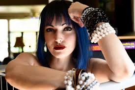 Anyone know why Nell is in this pic? Please tell me she is not coming back.