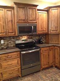 This microwave is just for looks, it is not usable. For Putting Microwave Over Stove Have Jeff Build Me A New Deeper Cabinet Over It Cabinetry By Husk Kitchen Renovation Rustic Kitchen Cabinets Kitchen Remodel