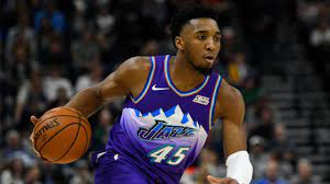 The '90s jazz wordmark is featured on the front chest. Mitchell S Rises For Jumper Over Portland S Mccollum After Step Back Ksl Sports