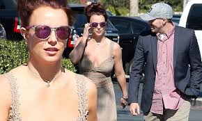 Britney Spears' boyfriend David Lucado can't take his eyes off singer's  plunging dress