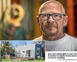 Moveable tiny home at centre of building row