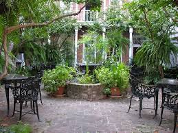 Classic Fountain Planted Heavily In French Quarter Courtyard Outdoor Garden Rooms Courtyard Landscaping Plants