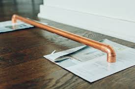 This project is so easy that my little man could have practically built it. Diy Copper Clothing Rack