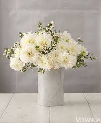 Of course, different flowers can have different meanings, even if they're the same hue. Beautiful White Flower Arrangements White Centerpiece Ideas