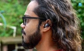 Start by flipping the earbud tip inside out, and then insert it over the latch at the bottom of the earbud. Samsung Galaxy Buds Live Review A Revolutionary Pair Of Beans With One Major Drawback